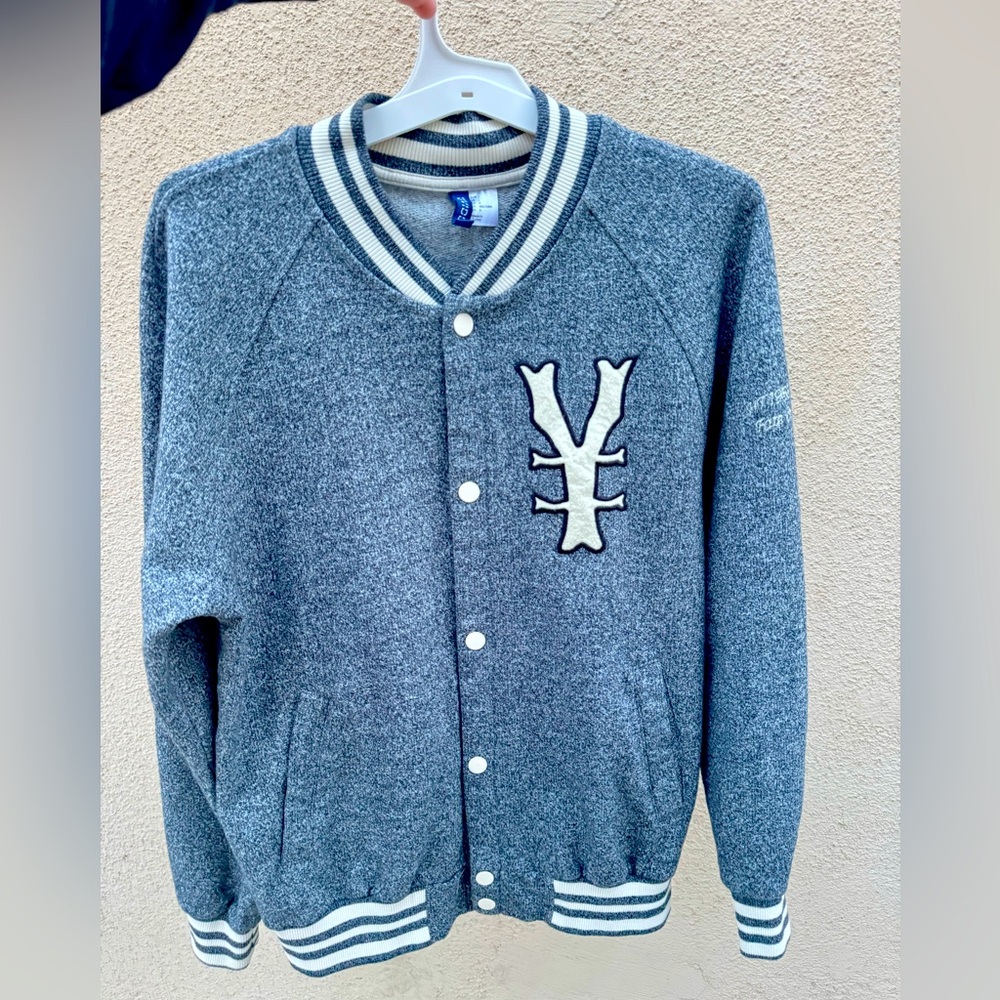 “Letterman Jacket” - Rough streets divided